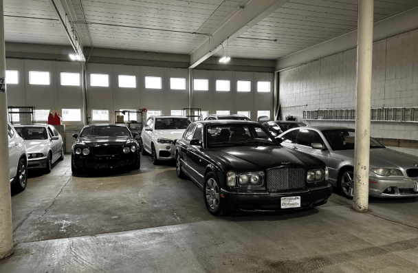 European auto repair in Milwaukee, WI by O'Reilly Motor Cars. Image of multiple luxury European vehicles parked inside the shop, highlighting professional service, detailed inspections, and high-end automotive care.
